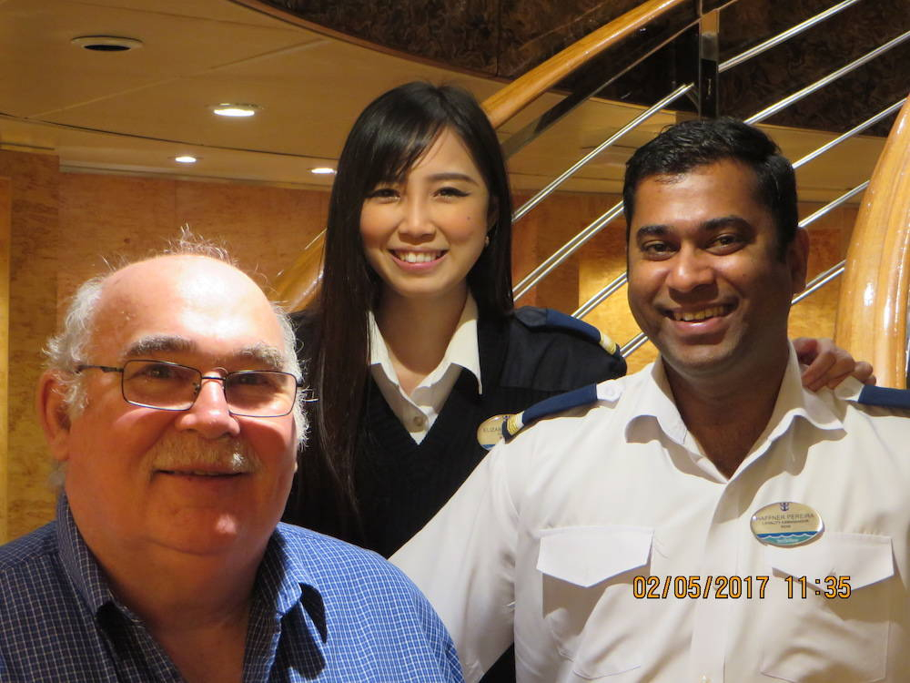 Patrick with crew members from Royal Caribbean