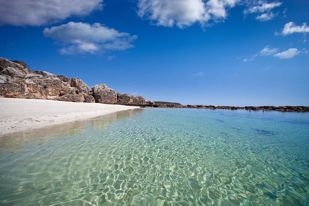 You'll emerge on to one of the best beaches on the island. Source: Getty