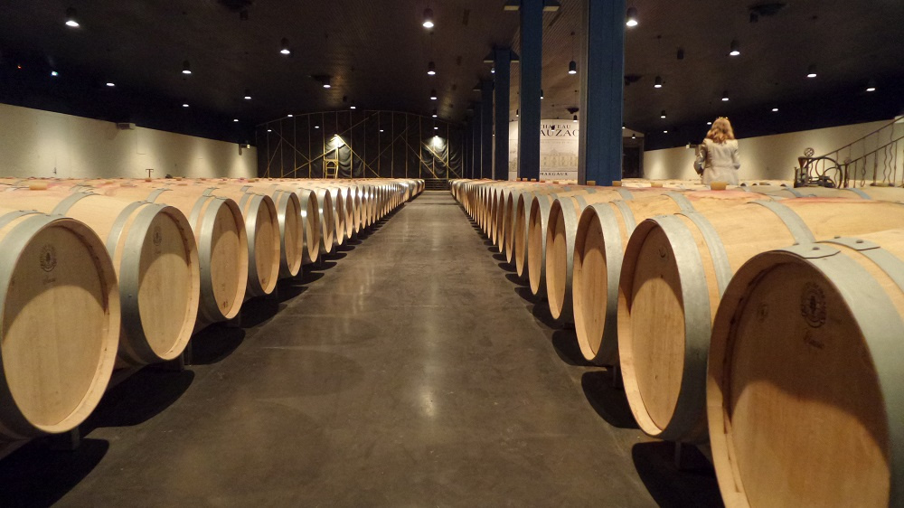 A modern barrel room at Dauzac Winery in Bordeaux. Source: Village to Villa