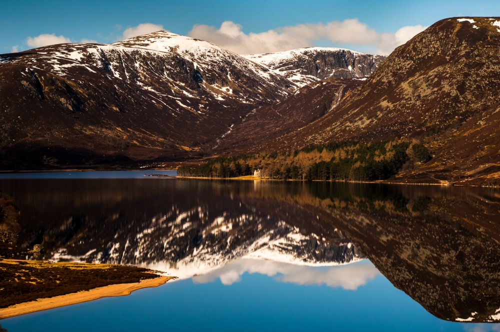 Loch Muick and Broad Cairn rising above Glas-allt Shiel lodge, one of the royal lodges. Source: Getty.